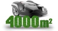 Automower® 440 w kolorze czarnym, z charakterystycznym logo Husqvarna, widoczny z boku. Na zielonym tle liczba 4000 m² z trawy, wskazująca obszar cięcia. Robot ma opływowy kształt i dużą obudowę, idealny do ogrodów.