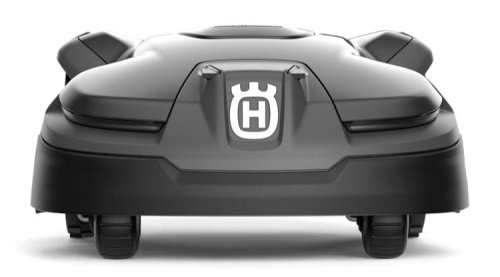 Robot koszący Husqvarna Automower® 415X w kolorze czarnym, widok z przodu. Na obudowie widoczne logo „H”. Produkt leży na płaskiej powierzchni, z widocznymi kółkami, co sugeruje mobilność. Brak dodatkowych akcesoriów w otoczeniu.