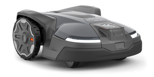 Robot koszący Husqvarna Automower® 450X NERA, ciemnoszary, zaokrąglony kształt, przód z LED, duże teksturowane koła, prezentowany z lekko uniesionym przodem na przezroczystym tle.