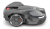 Automower® 450X NERA, ciemnoszary robot koszący z białymi akcentami, leżący z boku. Widoczne koła i panel sterujący z czerwonym przyciskiem. Ergonomiczny design do efektywnego koszenia trawnika.