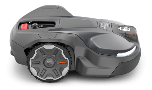 Automower® 430X NERA to robot koszący w kolorze ciemnoszarym. Wyposażony w solidne, wielokierunkowe koła oraz widoczne przyciski na obudowie. Produkt ukazany z boku, w pozycji leżącej, z widocznymi detalami na obudowie.