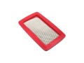 Filtr powietrza dmuchawy Husqvarna 170BF/580BFS z prostokątną, metalową siatką w centralnej części, otoczoną czerwoną, gumową ramką. Widok z boku, leżący na płaskiej powierzchni. Zewnętrze gładkie, z widoczną fakturą siatki wewnętrznej.