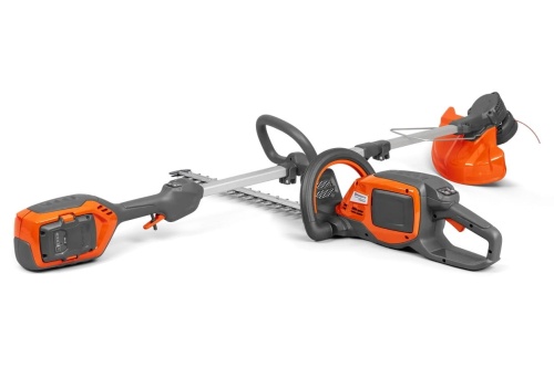 Zestaw: podkaszarka Husqvarna 215IL i nożyce 215iHD45 w pomarańczowo-szarym matowym kolorze. Podkaszarka z ergonomicznym uchwytem i widoczną baterią, nożyce z długimi ostrzami z drobnymi ząbkami, tło neutralne.