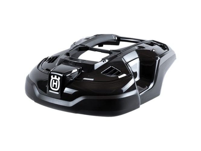 Czarna, aerodynamczna obudowa robota koszącego Automower z trwałego plastiku, widoczna z boku, z logo producenta, detalami konstrukcji, przeznaczona do systemu koszącego.