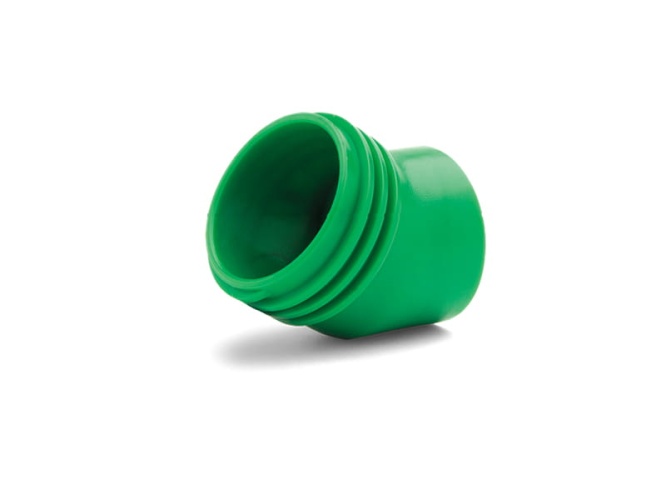 Łącznik wlewki do kanistra 6L Husqvarna, w kolorze zielonym, wykonany z plastiku, przedstawiony w pozycji leżącej. Widoczne wgłębienia na górnej części ułatwiające montaż. Tło jasne, co podkreśla detale produktu.