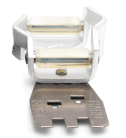 Prowadnik pilnika 4,8mm .325 1,5mm + przymiar Husqvarna w kolorze metalicznym, z przezroczystymi elementami, widoczny z boku. Na dolnej części umieszczone są oznaczenia SOFT i HARD. Produkt leży na płaskiej powierzchni.