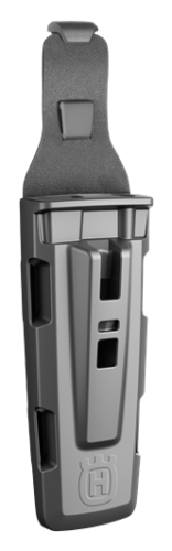 Uchwyt na pilnik i klucz Husqvarna w kolorze szarym, w pozycji wiszącej. Produkt wykonany z tworzywa sztucznego, o prostym kształcie z wycięciami. Widoczne logo Husqvarna na froncie oraz element mocujący z tyłu.