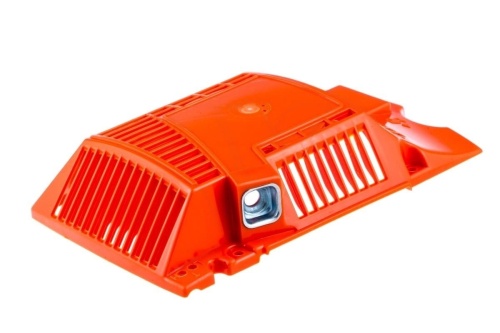 Obudowa rozrusznika pilarki Husqvarna 266 w pomarańczowym tworzywie, widok bokiem. Leży na płasko, z przodu otwory wentylacyjne i metalowy element montażowy.