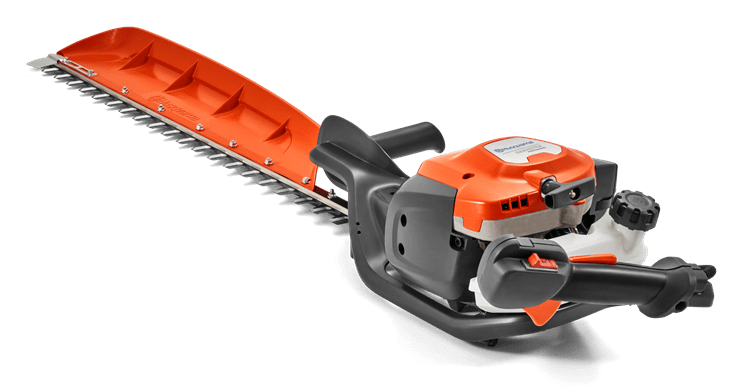 Nożyce spalinowe do żywopłotu Husqvarna 522HS75X w kolorze pomarańczowym i czarnym, z metalowym ostrzem o długości 75 cm i ergonomiczną rączką. Produkt przedstawiony z boku, ukazując jego mocowanie i detale konstrukcyjne. Tło jednolite.