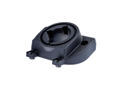 Wspornik nożyc Husqvarna 225H75/225H60 w kolorze czarnym, wykonany z plastiku. Produkt widoczny w ujęciu z boku, leży na płaskiej powierzchni. Posiada otwór centralny oraz dwa mocowania, które są widoczne z przodu.