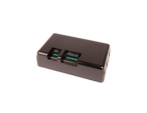 Akumulator Automower 405X/415X/310E Nera Husqvarna, czarny, prostokątny kształt. Ujęcie z boku, widoczne dwa gniazda podłączeniowe z zielonymi elementami. Tło białe. Akumulator nowy, bez dodatkowych elementów i akcesoriów.