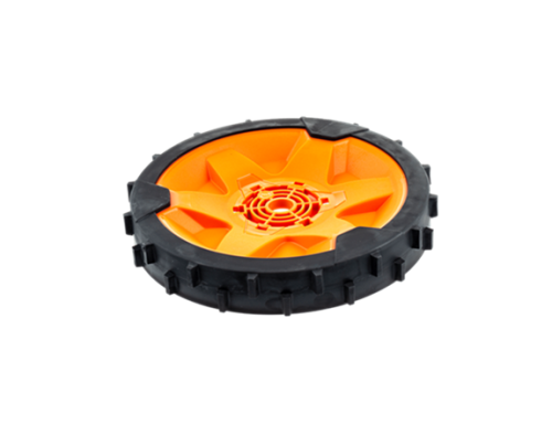 Koło tylne do kosiarki Automower 315X/405X/415X Husqvarna, o okrągłej budowie, zewnętrzna część w kolorze czarnym, wewnętrzna pomarańczowa z wyżłobieniami. Ułożenie poziome, widok z góry, bez dodatkowych akcesoriów.