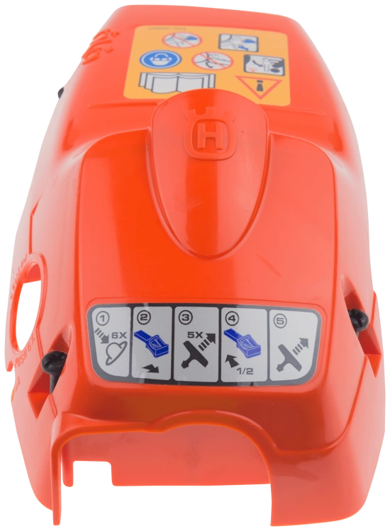 Pokrywa cylindra pilarki Husqvarna 120 MARK II/235, pomarańczowa, z przodu. Widać symbole instrukcji, logo, otwory montażowe oraz detale konstrukcji. Gładka, plastikowa, bez zarysowań.