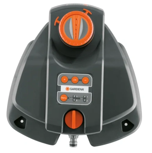 Zraszacz Comfort AquaContour w szaro-pomarańczowym kolorze, z okrągłym pokrętłem i przyciskami. Automatyczne nawadnianie, idealny do ogrodów.