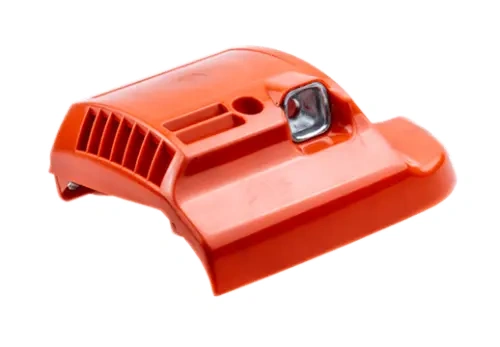 Obudowa rozrusznika nożyc Husqvarna w intensywnym pomarańczowym kolorze, o gładkiej fakturze i zaokrąglonym kształcie. Ujęcie z boku, ukazujące otwór na śrubę oraz wentylację. Produkt nowy, bez akcesoriów, na neutralnym tle.