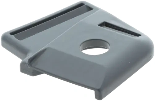 Zatrzask dolny szelek Standard Husqvarna w kolorze szarym, wykonany z wytrzymałego plastiku. Ujęcie z góry, ukazujące prostokątny kształt z wycięciem na śrubę oraz dwoma otworami montażowymi. Produkt leży na jednolitym tle.