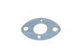 Uszczelka wykaszarki 253RJ Husqvarna w kształcie owalu, wykonana z metalowego materiału o matowej powierzchni. Widoczne otwory montażowe oraz centralny okrągły wycięcie. Ujęcie z góry na jednolitym tle.