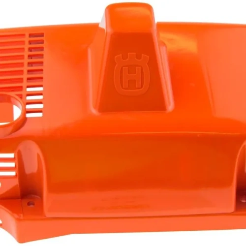 Pokrywa cylindra wykaszarki Husqvarna 227 R w intensywnym pomarańczowym kolorze, z widocznym logo producenta. Prezentowana frontalnie, z wyraźnymi otworami wentylacyjnymi i gładką, plastikową powierzchnią. Produkt nowy, stojący na jednolitym tle.