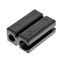 Regulator dmuchawy 525BX Husqvarna w kolorze czarnym, wykonany z tworzywa sztucznego. Ujęcie frontalne ukazuje prostokątny kształt z dwoma otworami. Produkt leży na płaskiej powierzchni, tło jednolite, białe. Brak widocznych napisów lub logo.