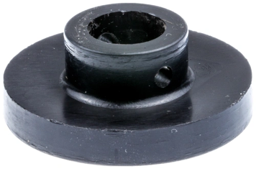 Blokada łańcucha ridera R418Ts Husqvarna, okrągła, czarna, z centralnym otworem montażowym i małymi wyżłobieniami. Ujęcie z góry na stojący, nieprzezroczysty element, widoczne detale konstrukcyjne zapewniające trwałość.