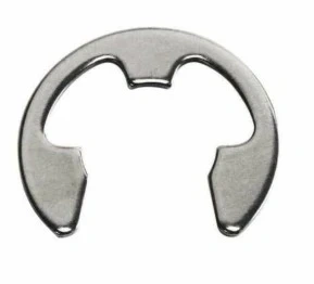 Zacisk ridera R419Ts Husqvarna, metalowy, okrągły kształt z wycięciami, bez wykończenia. Ujęcie z góry, eksponuje detale krawędzi. Tło jednolite, białe, co podkreśla produkt. Dobrze widoczne mocowania.