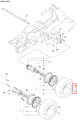 Nakrętka koła ridera R418Ts Husqvarna, metalowa, w kolorze srebrnym, widoczna w detalu w kontekście montażu koła. Elementy mocujące oraz otwór na śrubę są wyraźnie widoczne, zbliżenie na kształt i teksturę.
