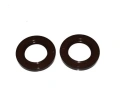 Zestaw uszczelek do odśnieżarki ST 327P Husqvarna, składający się z dwóch ciemnobrązowych elementów o okrągłym kształcie. Uszczelki mają gładką powierzchnię oraz centralne otwory. Widok z góry, na jednolitym tle.