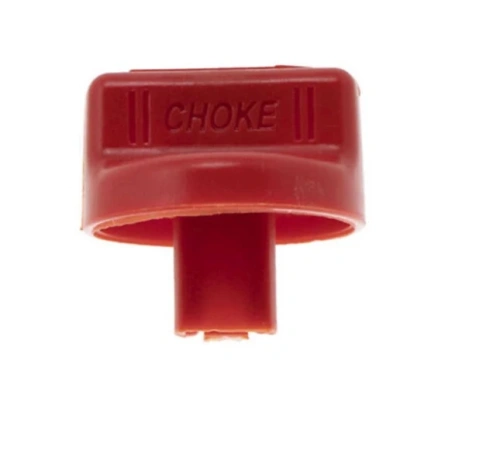 Czerwony element z tworzywa sztucznego, będący dźwignią ssania, z napisem CHOKE. Widok z przodu, pokazujący kształt prostokątny oraz wylot w dolnej części. Produkt przeznaczony do odśnieżarki Husqvarna ST 327P.