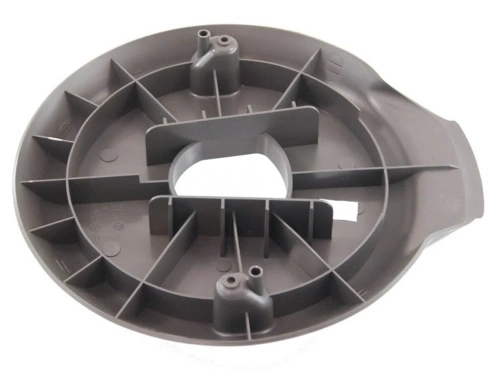 Osłona paska kosiarki LB 248S Husqvarna w kolorze szarym, okrągła z centralnym otworem. Widoczna struktura wewnętrzna z żeberkami wzmacniającymi. Ujęcie frontalne, produkt stoi na płaskiej powierzchni. Brak widocznych napisów lub logo.