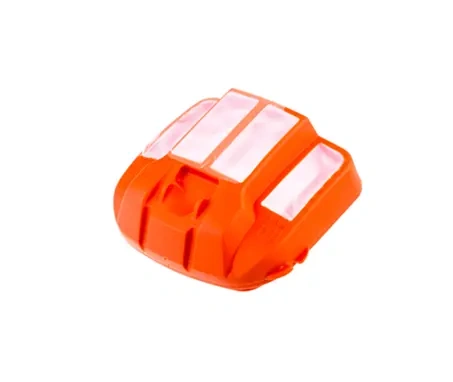 Filtr powietrza do pilarki Husqvarna 555/556/560XP w kolorze pomarańczowym, z teksturą plastiku. Stojący, widok frontalny. Zawiera dwie białe szczeliny wentylacyjne. Proste tło, brak dodatkowych elementów.