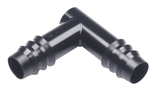 Czarna nakrętka kosiarki o zerowym promieniu skrętu, wykonana z tworzywa sztucznego, w kształcie litery T. Ujęcie z boku ukazuje dwie średnice końcówek do montażu. Widoczne rowki na złączach, zapewniające dobre trzymanie. Tło jednolite.