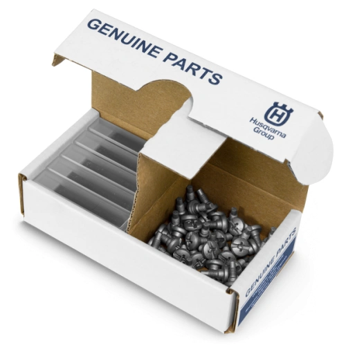 Zestaw noży do robota koszącego Automower 310E NERA Husqvarna w widoku z góry. Otwarta tekturowa pudełko z napisem GENUINE PARTS w kolorze niebieskim. Wnętrze zawiera metalowe noże oraz przezroczyste schowki na akcesoria.