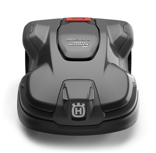 Obudowa robota koszącego Automower 405X Husqvarna w kolorze ciemnoszarym. Produkt widoczny frontalnie, z przyciskiem start na górze oraz logo Husqvarna. Wykończenie matowe z delikatnymi zaokrągleniami, odznaczające się kompaktowym kształtem.