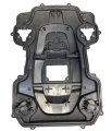 Czarna obudowa robota koszącego Automower 550 Husqvarna z wnętrzem na elementy montażowe i miejsce na przewody, gładka plastikowa powierzchnia z detalami i zagłębieniami.