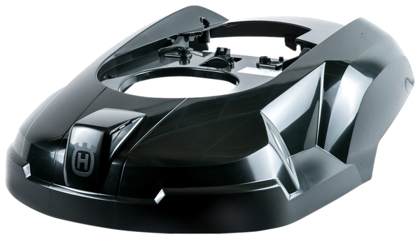 Obudowa górna robota koszącego Automower 220 AC Husqvarna, w kolorze ciemnoszarym, z gładką, błyszczącą powierzchnią. Położona na boku, z widocznym miejscem na mocowanie. Logo Husqvarna umieszczone na przodzie.
