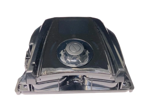 Pokrywa robota koszącego AUTOMOWER 435X AWD Husqvarna w kolorze czarnym, o gładkiej powierzchni, z widocznym centralnym przyciskiem. Produkt prezentowany z góry, w pozycji leżącej, na białym tle. Brak dodatkowych akcesoriów.