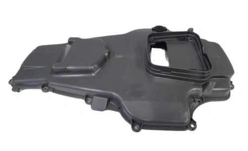 Podwozie górne robota koszącego Automower 320 NERA w kolorze czarnym, wykonane z tworzywa sztucznego. Ujęcie z boku, ukazuje otwór na złącze oraz elementy mocujące. Tło jednolite, co podkreśla detale produktu.