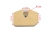 Filtr powietrza do pilarki Husqvarna 254XP i 257, w kształcie prostokąta, o wymiarach 5,7 cm x 3,5 cm i otworze o średnicy 1,5 cm. W kolorze jasnożółtym, z teksturowaną powierzchnią. Pokazany z góry, na jednolitym tle.