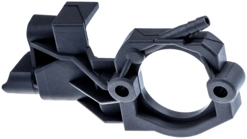 Podstawa gaźnika do pilarek Husqvarna 357XP i 359, czarna, z tworzywa. Widać otwór i przyłącze, leży na jasnym tle. Do montażu gaźnika w urządzeniu.