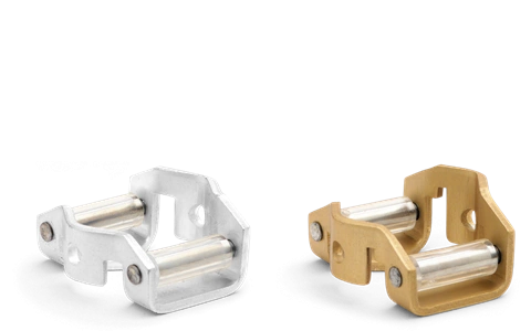 Metalowy prowadnik pilnika 4,0x1,3 mm Husqvarna w kolorze srebrnym i złotym. Ujęcie frontalne dwóch wariantów z rolkami i widocznymi mocowaniami na jednolitym tle, do precyzyjnego szlifowania.