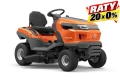 Traktor TS 215T Husqvarna w kolorze pomarańczowym z ciemnoszarymi detalami. Ujęcie z boku, ukazujące siedzisko oraz kierownicę. Widoczne logo Husqvarna, duże, trwałe opony. Produkt stojący na prostym tle, bez dodatkowych elementów.