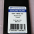 Nóż kosiarki Husqvarna LC 146 SP, kod 5811889-10, o szerokości cięcia 460 mm. Etykieta z informacją o typie ostrza (Combi) oraz kodem kreskowym. Tło proste, wizualizacja detali napisu i logo.